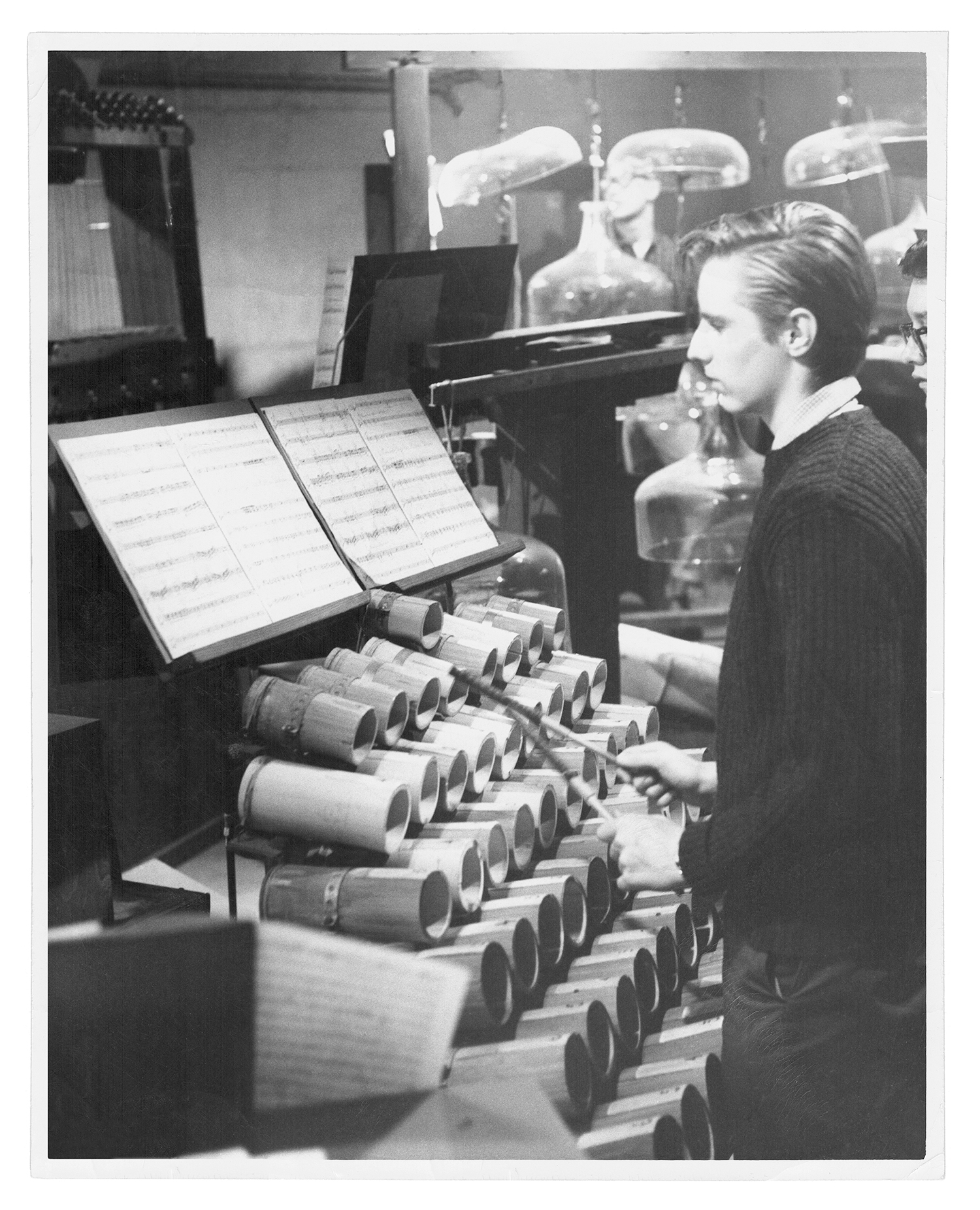 Ranta rehearsing Revelation  in the Courthouse Park as part of the Harry Partch Ensemble, University of Illinois Urbana- Champaign, 1961. Photographer unknown